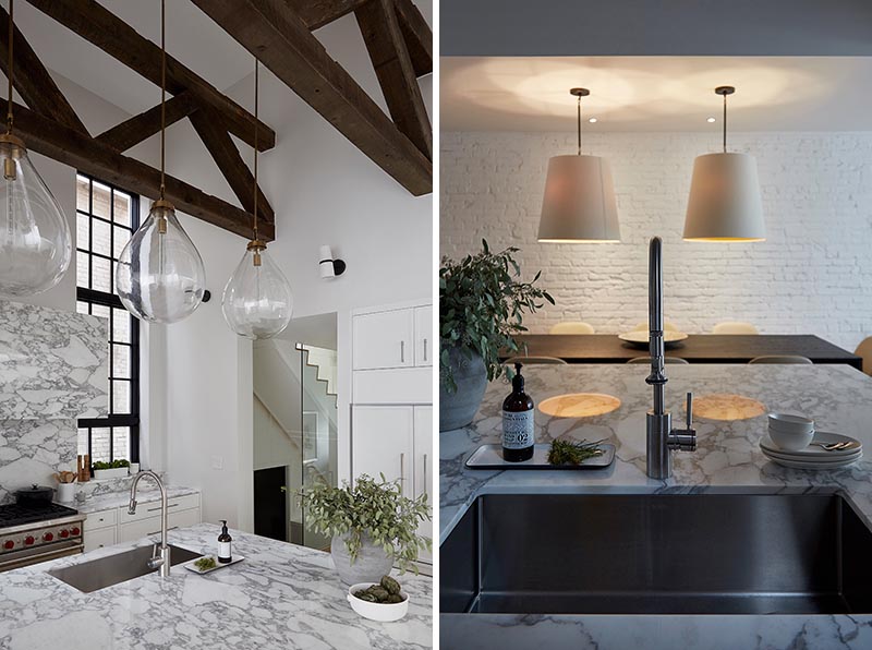 By having a square kitchen island with a white and marble finish, the designers of this kitchen were able to include four spaces for seating in the form of counter stools, which is ideal if you're entertaining and want to interact with the person cooking, or if you need a spot to have a quick bite to eat. #SquareIsland #SquareKitchenIsland #KitchenDesign #KitchenIsland #IslandWithSeating