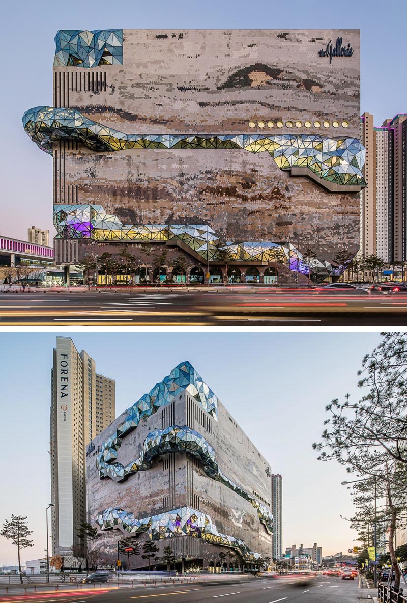 The Galleria department store has a textured mosaic stone facade with multifaceted glass accents that were inspired by the nature of the neighboring park. #DepartmentStore #Architecture #Windows #Facade #BuildingFacade