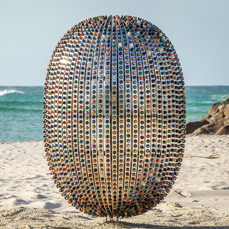 The sculpture represents the rapid multiplying of single use coffee capsules, which symbolizes human convenience and its impact on our environment. #Sculpture #Art #ModernSculpture #Design