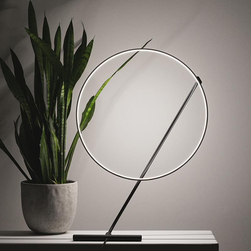 A glowing circle that freely levitates around a line. By changing the position, POISE can have a dynamic or static appeal. #ModernTableLamp #Lamp #Lighting