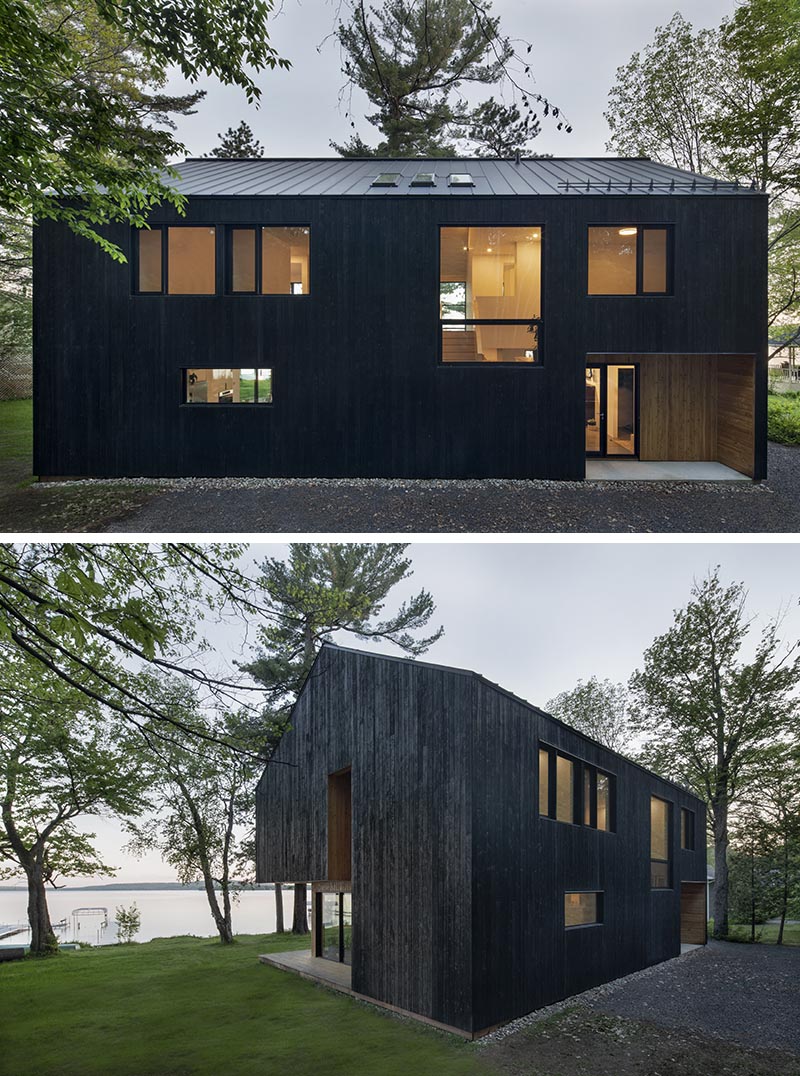 The exterior of this modern house is clad in larch, which is a type of pine tree, and has been charred to give it that burnt look. It also contrasts the recessed wood that's been finished with a natural oil. #BlackHouseSiding #BlackHouse #CharredWoodSiding #ShouSugiBan #BurntWoodSiding