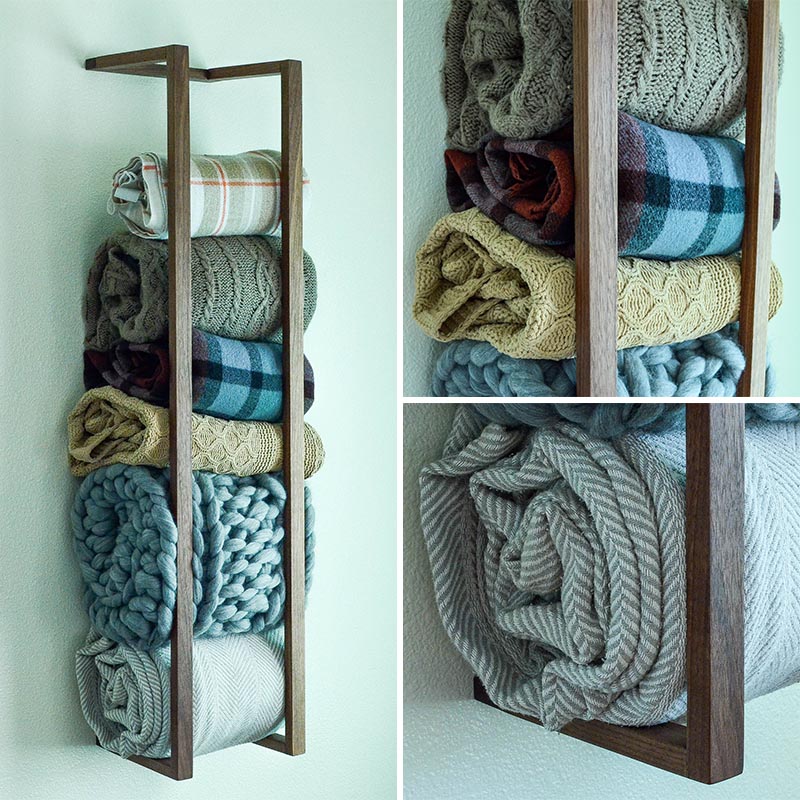 If you don't have any floor space, a great way to add extra storage is to look at your walls for room. A blanket shelf attaches to your wall and holds your blankets, rolled up, until you need them. This is also a great way to show off your blanket collection. #BlanketShelf #BlanketStorage #HomeDecor #ModernDecor