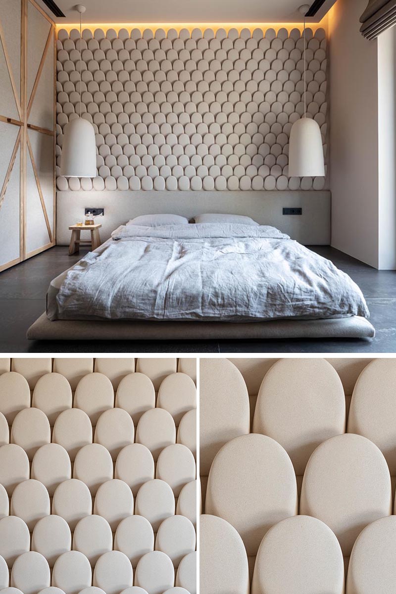 This modern bedroom features an eye-catching accent wall, that looks like small rounded stones, and helps to add texture to the room. #AccentWall #ModernBedroom #SculpturalWall #BedroomDesign