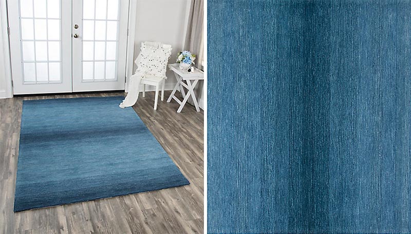 An area rug is one way to help define a space within a home. Depending on the size of the rug, it can be used to create a sitting room within an open floor plan or define an entryway. #ModernRug #BlueRug #AccentRug #AreaRug #ModernDecor