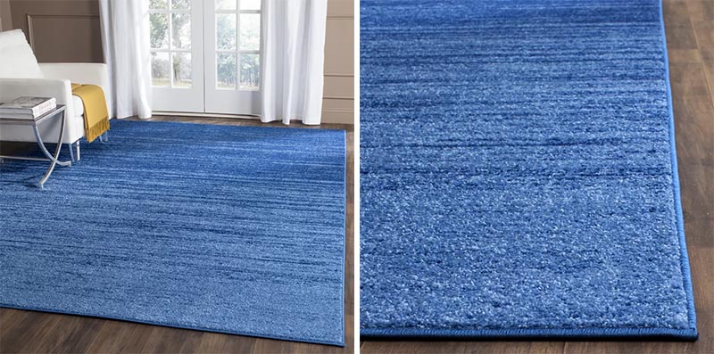 An area rug is one way to help define a space within a home. Depending on the size of the rug, it can be used to create a sitting room within an open floor plan or define an entryway. #ModernRug #BlueRug #AccentRug #AreaRug #ModernDecor