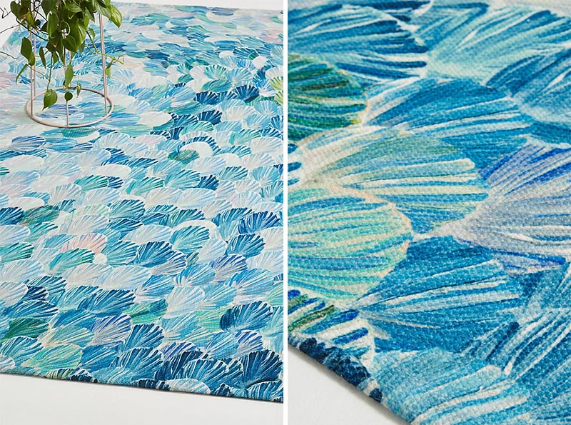 Outdoors, like on a patio or balcony, is a place where people don't often think they can include a rug, but they're ideal for creating a designated zone in an open space. #OutdoorRug #ModernOutdoorRug #BlueOutdoorRug #Decor