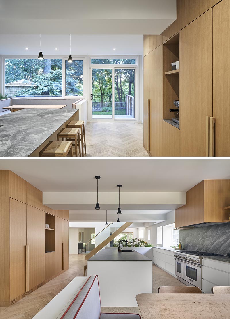 This modern built-in kitchen wood cabinetry lines an entire wall, and features a open coffee station and minimalist hardware, that matches the cabinets and runs all the way to the door. #KitchenHardware #KitchenCabinets #WoodCabinets #WoodKitchen #KitchenIdeas