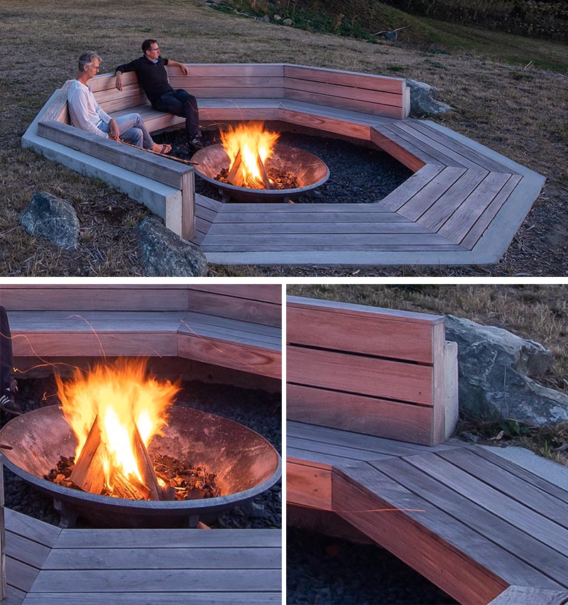 A octagonal outdoor fire pit has a wood bench that wraps around it.