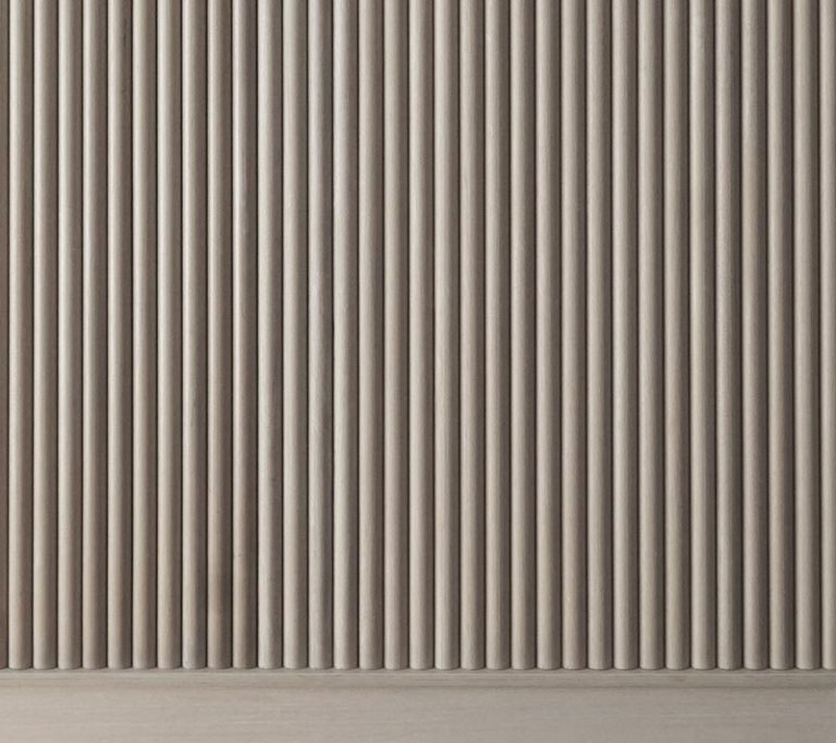 A Wall Of Wood Dowels Creates A Calm Texture For This Bedroom