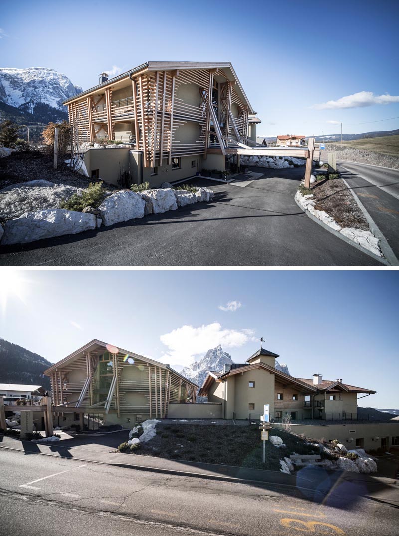 Rows of wood poles have been threaded through vertical supports, and surround the solid walls of this modern hotel, creating a look reminiscent of local farmhouses. #HotelDesign #WoodExterior #LogWood #WoodFacade #Architecture