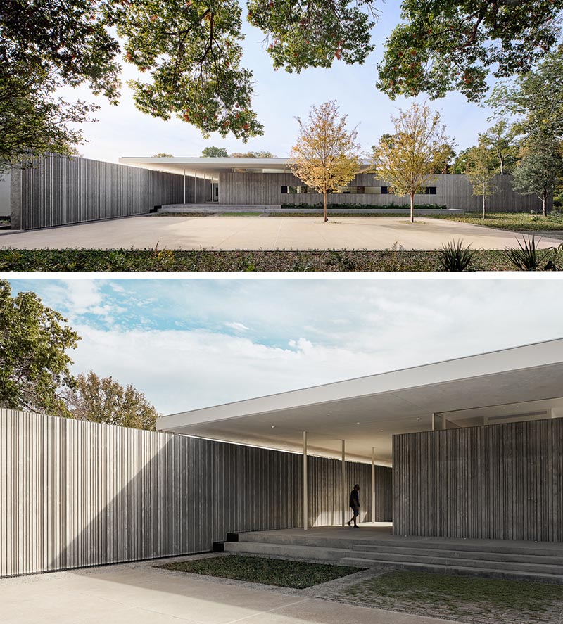 Heavy concrete walls with a corrugated appearance extend from the interior of the house out into the landscape, with a floating pavilion roof hovering above. #ConcreteWalls #ModernArchitecture #CorrugatedConcrete #HouseDesign #ModernHouse