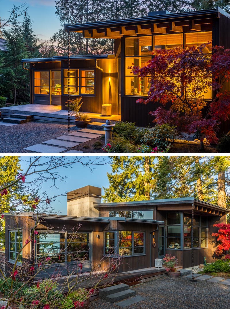 This modern house has deep overhanging eaves with exposed cedar rafters, offering protection from the weather and connecting to rain chains, aiding with the flow of rainwater into the garden. #OverhangingEaves #DeepEaves #ModernArchitecture #ExposedRafters#CedarRafters #HouseDesign #PacificNorthwest