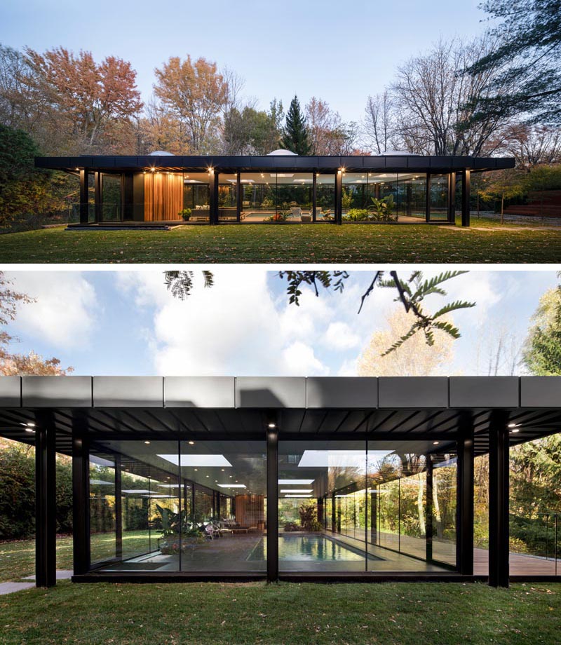 With walls of glass and a black steel frame, this pool house is like an oasis in the heart of a garden, enabling the home owner to go for a swim in the cold Canadian winters. #ModernPoolHouse #PoolHouse #Architecture