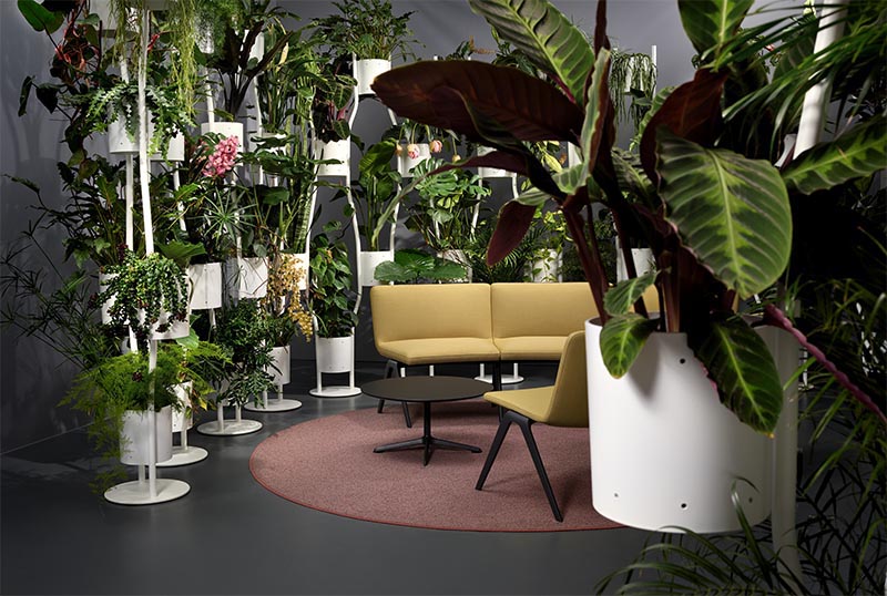 Ippolito Fleitz Group has designed a modern room divider that incorporates plant holders, creating an easy way of adding plants to a room without taking up additional space. #RoomDivider #RoomPartition #Plants #InteriorDesign #WorkplaceDesign