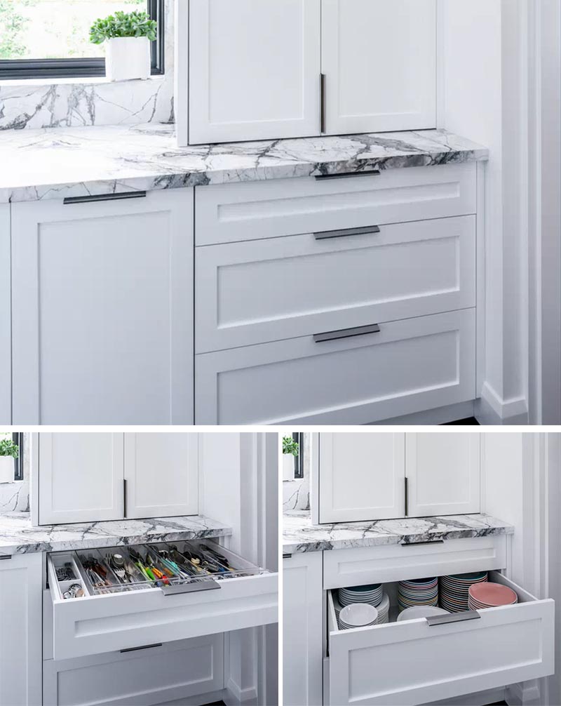 This modern kitchen has organized drawers for storing casual cutlery and stacked plates. #KitchenDesign #KitchenIdeas #KitchenStorage #KitchenOrganization