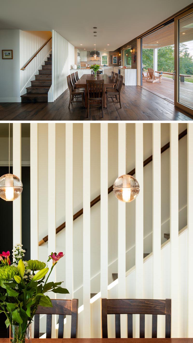 These stairs feature a leather-wrapped handrail that provides added grip and a contrast to the light wood. #HandrailIdeas #LeatherHandrail #StairIdeas