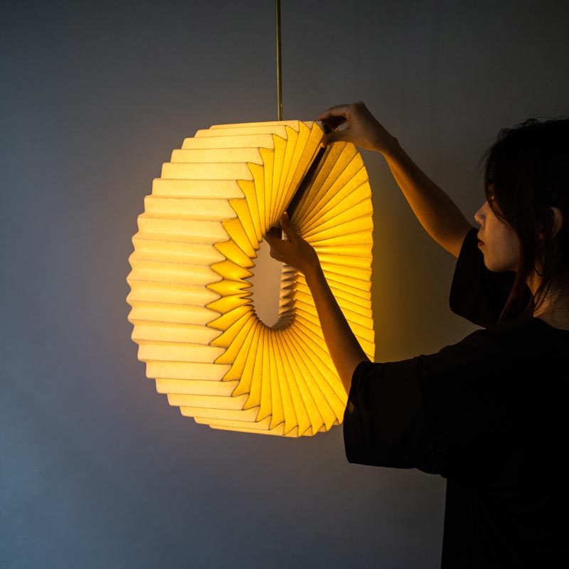 Mobius Pendant Lamp by Nhi Ton.