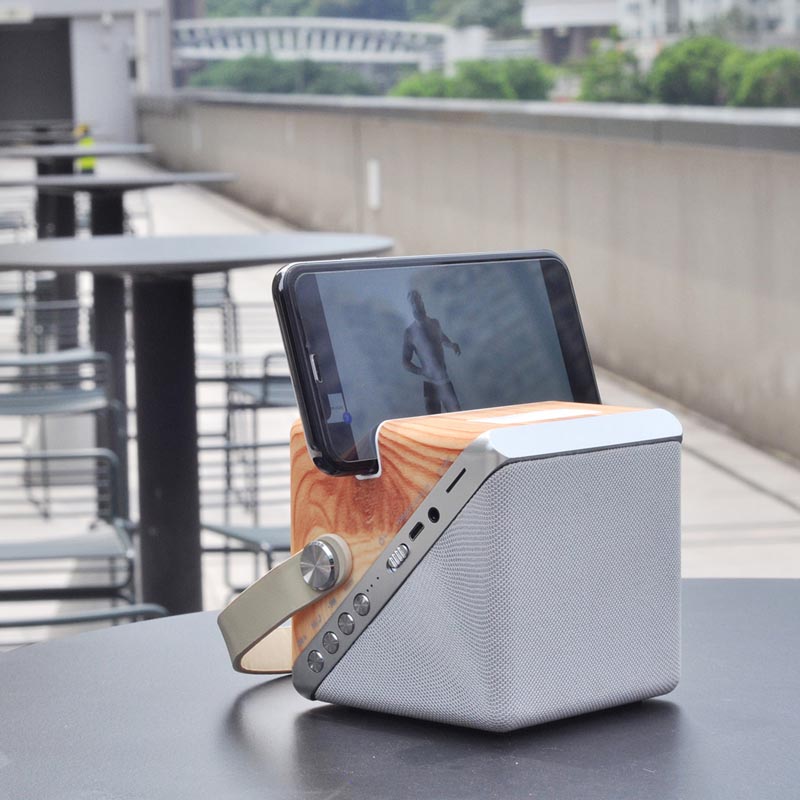 Twist Cube Wireless Charger with Bluetooth Speaker by Fai Leung