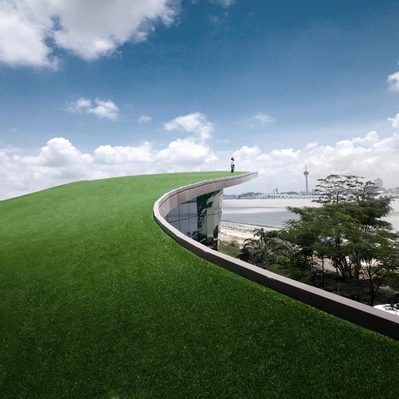 A curved roof lined with grass.