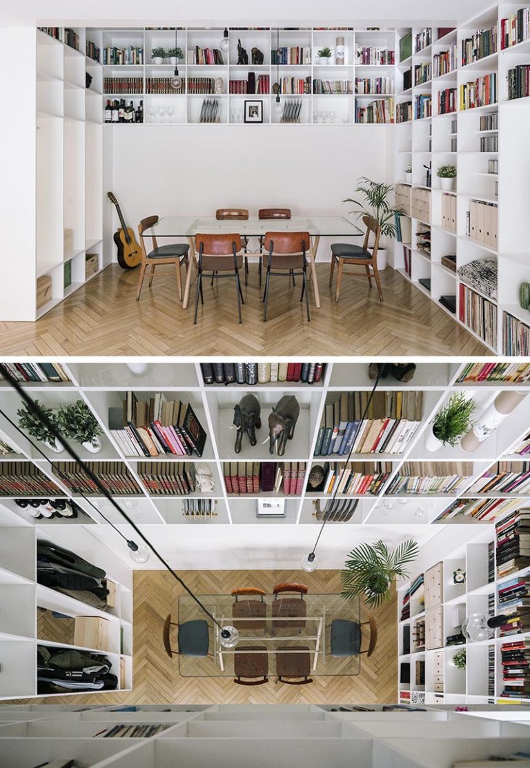 A DoubleHeight Bookshelf Travels Over Two Floors Of This House