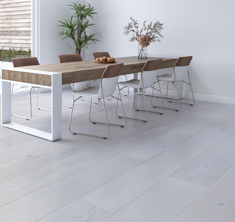 Light-toned wide plank wood flooring is often chosen for contemporary homes, as it adds visual interest to an interior without drawing attention away from other design elements. #WidePlankFlooring #LightWoodFlooring #FlooringIdeas