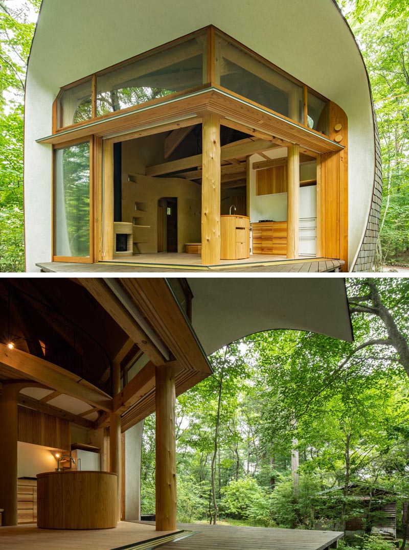 This small house has large sliding doors that help to create an indoor / outdoor living experience, and allow the occupants to enjoy the nature that surrounds the home. #SmallHouse #Architecture #Doors #CurvedHouse