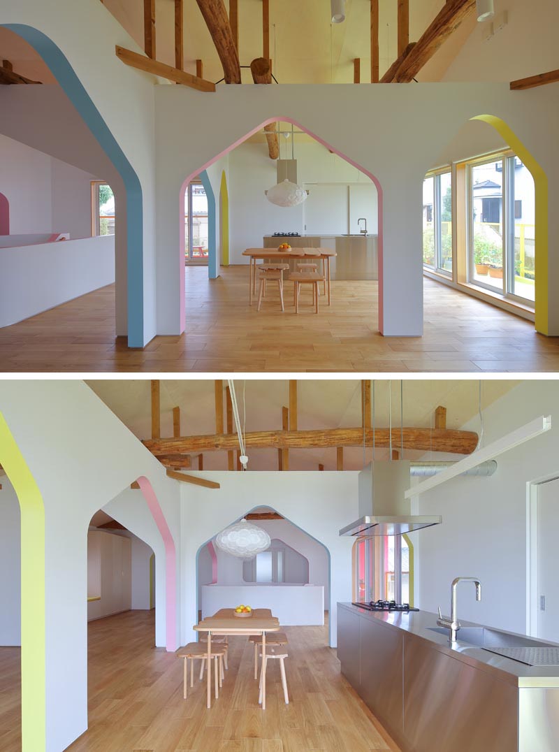 This modern home / design studio features bright white walls with arches that have accentuated with soft blues, yellows, and pinks. #InteriorDesign #Arches #InteriorArches #WhiteWalls
