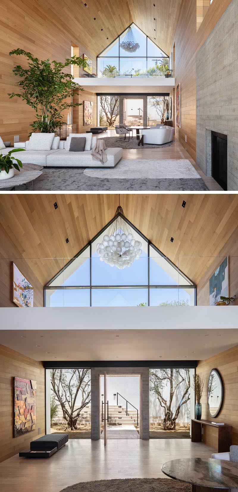 The eye-catching gabled design of this modern barn-inspired house, is easily seen upon approach to the house, and once inside, the wall of windows and doors at the other end of the wood-lined great room showcase the swimming pool and view. #ModernHouse #ModernArchitecture #HouseDesign #GabledRoof #GreatRoom