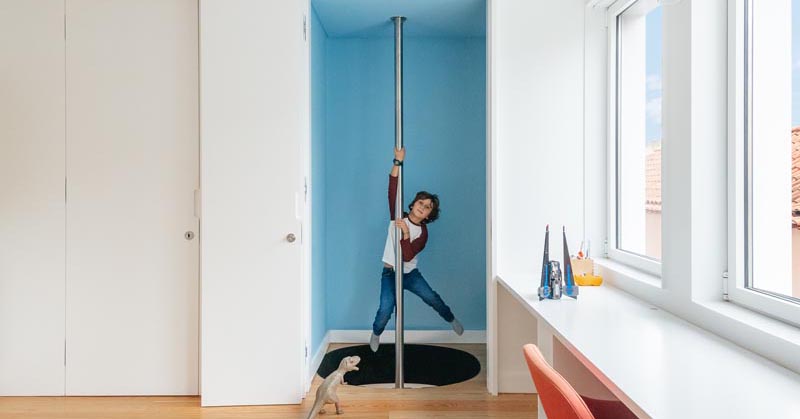 A Fire Pole Hidden Behind A Door Creates A Unique Way To Travel Between Floors