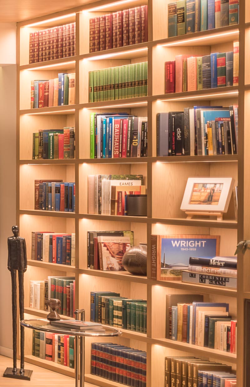 Wood living room shelving with hidden LED lighting.