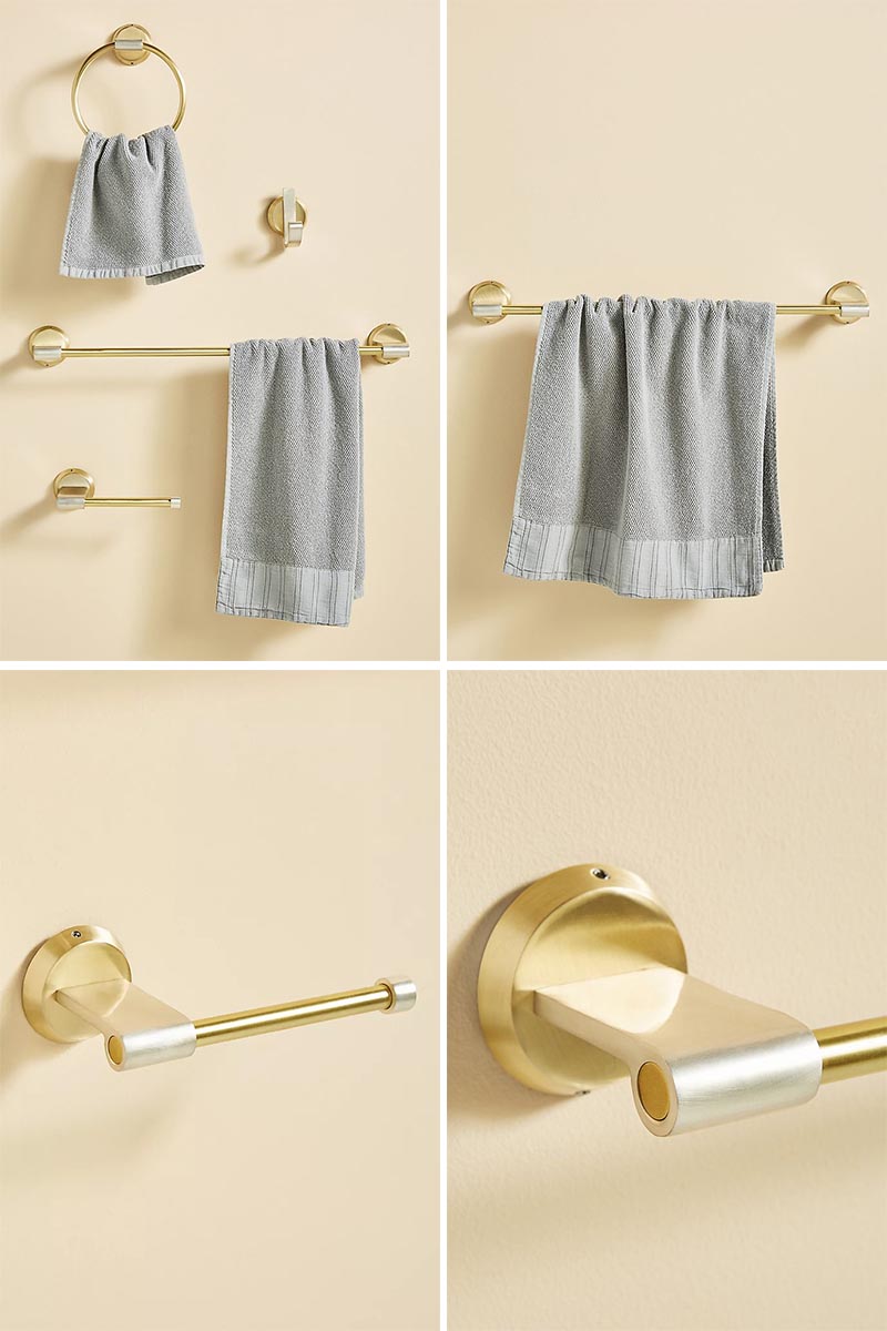 Modern metallic bathroom hardware with a gold brass and silver accent.
