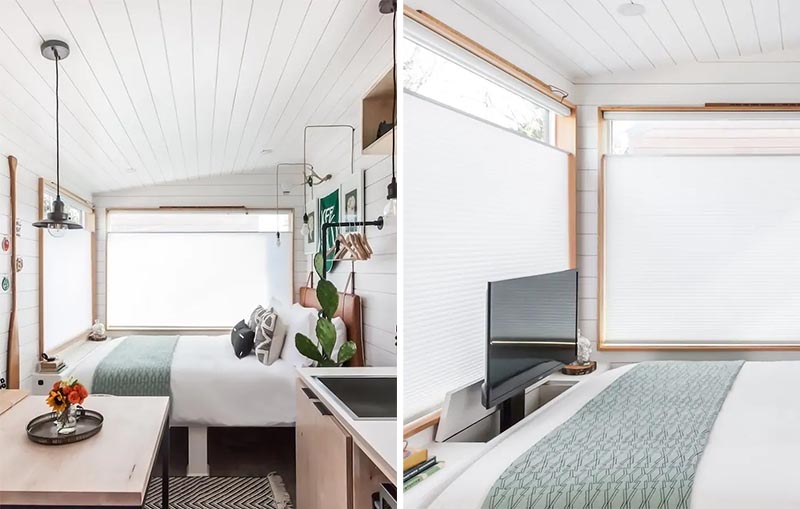 A great idea for including a tv in small space is to hide it within a cabinet, like this tiny house does at the end of the bed.