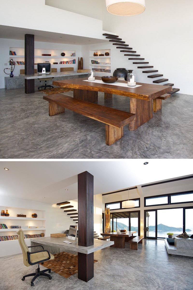 A custom concrete desk uses a wood column as support in this home office.