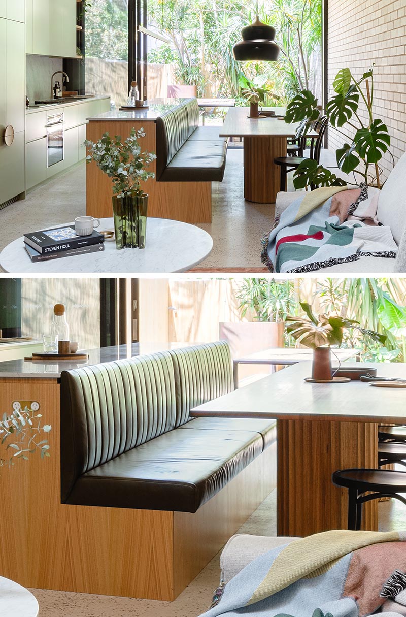 This Kitchen Island Saves Space In A Narrow Interior By Including Built In Banquette Seating