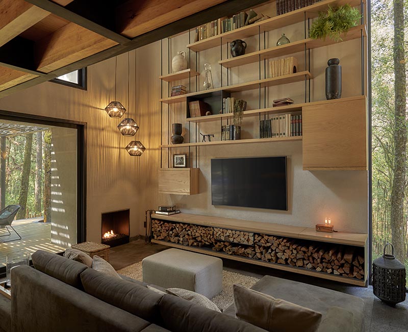 Open Wood Shelving Helps Fill Out This TV Wall