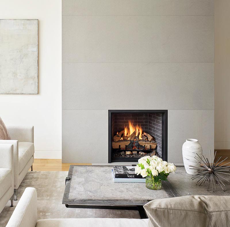 A Modern Minimalist Fireplace Surround Contributes To The Quiet Serenity Of This Living Room