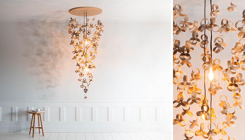 A sculptural chandelier made from wood curls.