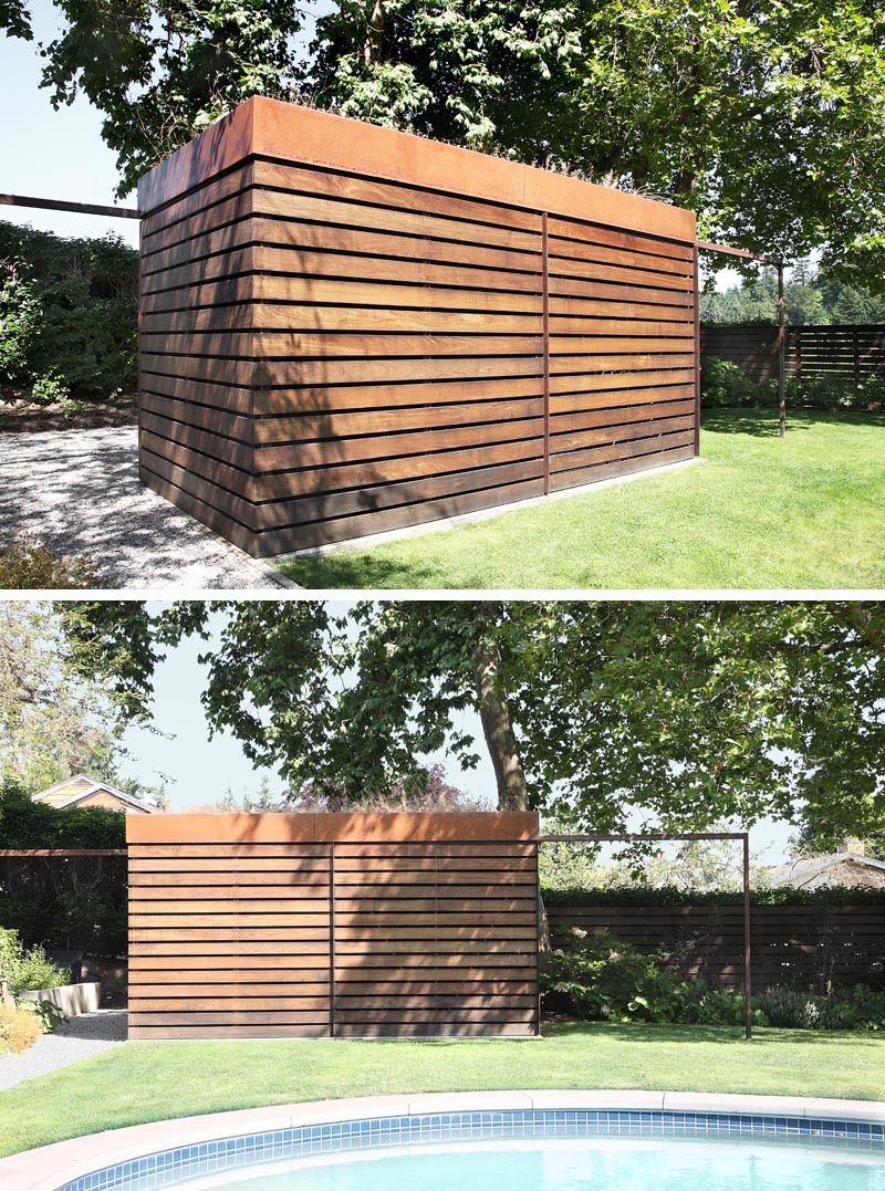 A modern backyard shed with a green roof, that's made from Ipe wood and weathered steel.