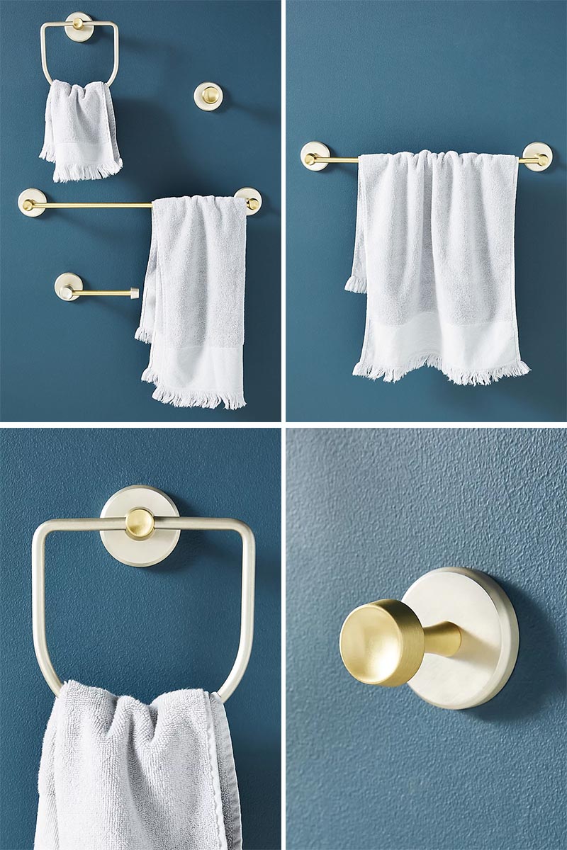 Modern metallic bathroom hardware that combines brass and silver finishes.