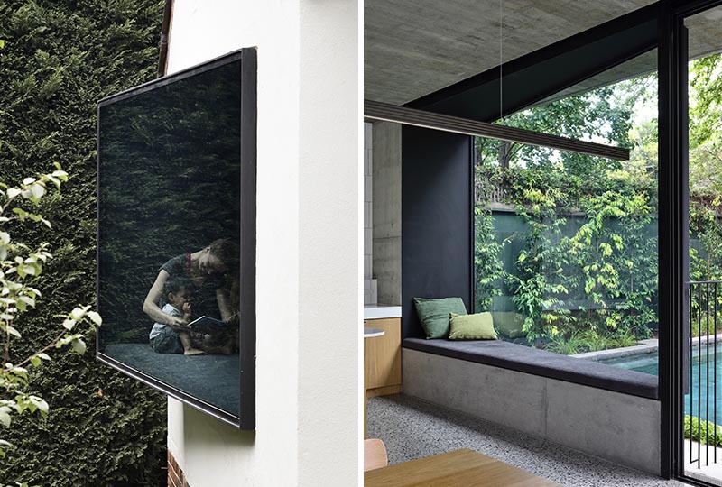 Wedge-Shaped Window Seats Offer A Place To Sit And Relax In This House