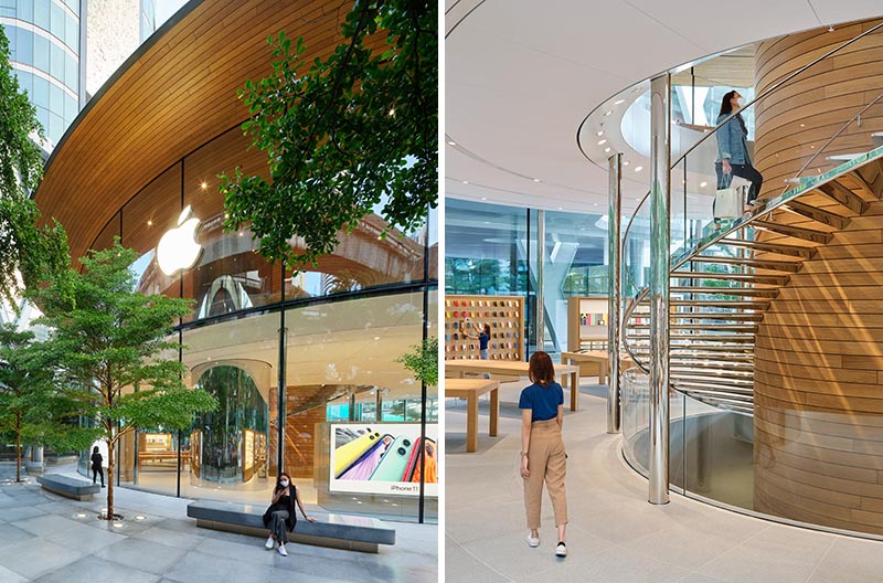 Apple Central World in Bangkok has a curved glass facade and a large wood canopy roof.