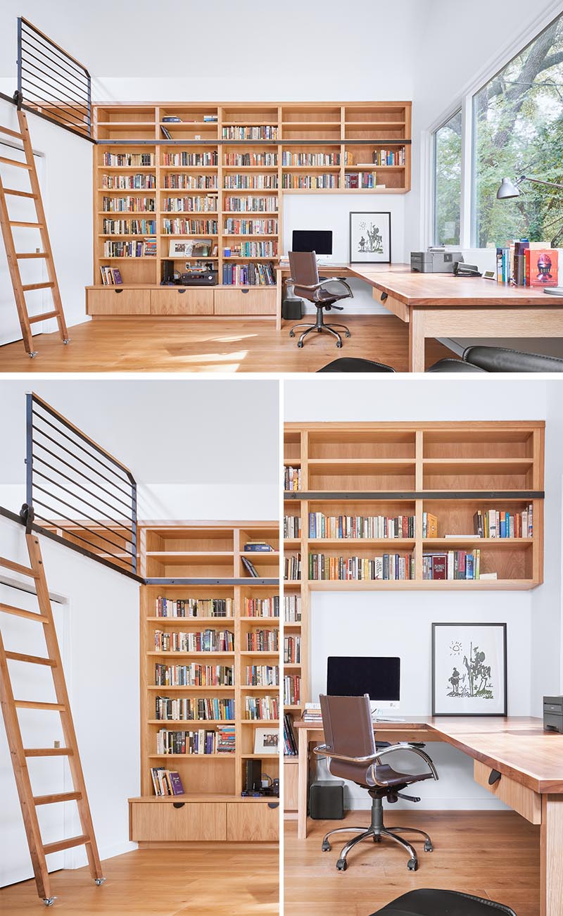 A modern home office with a large wood desk, bookshelves, and a loft that's designed as a guest suite.