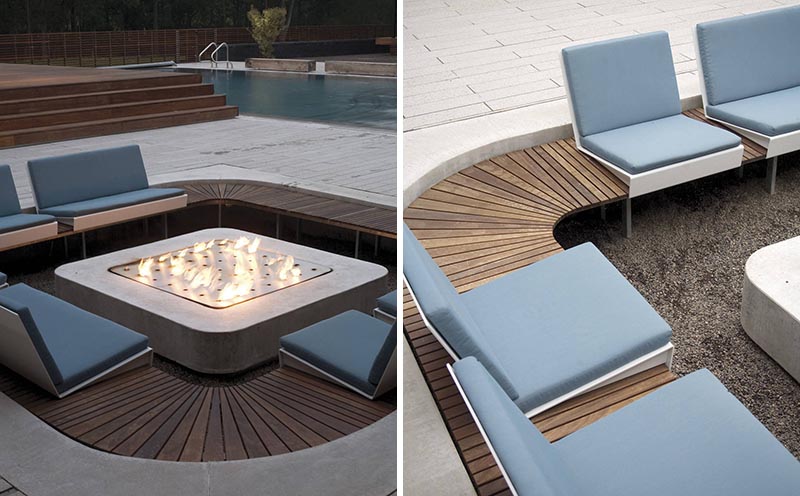 A modern outdoor conversation pit has a square shape that's lined with custom seating surrounding a fireplace.