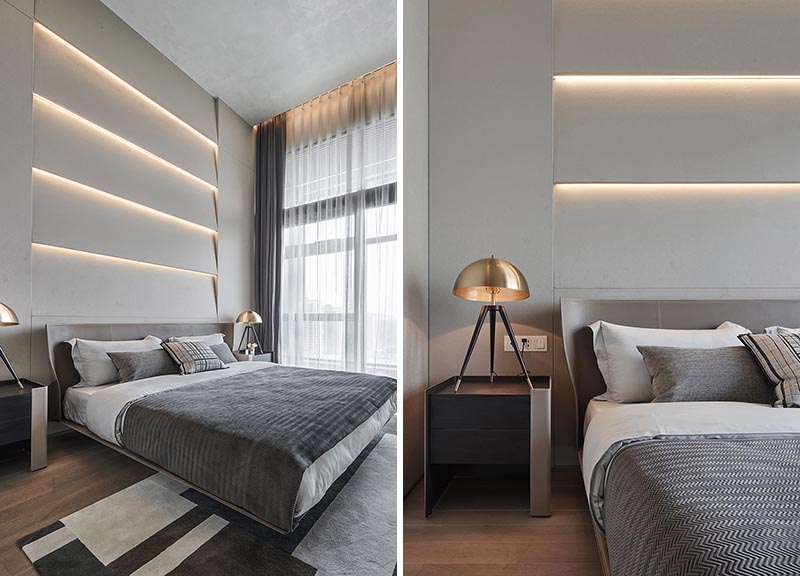 A bedroom accent wall with angled sections and hidden lighting.