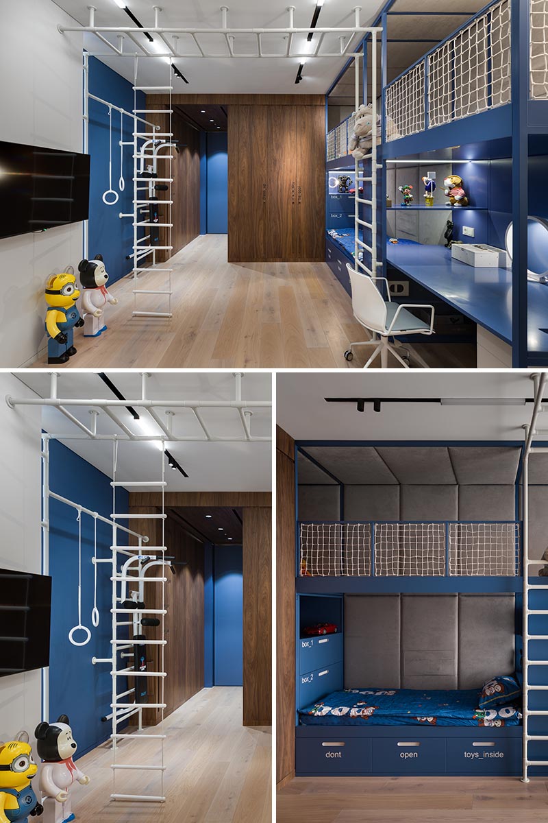 A modern kids bedroom that includes a climbing gym, a built-in bed, storage, a homework station, and a lofted play space.