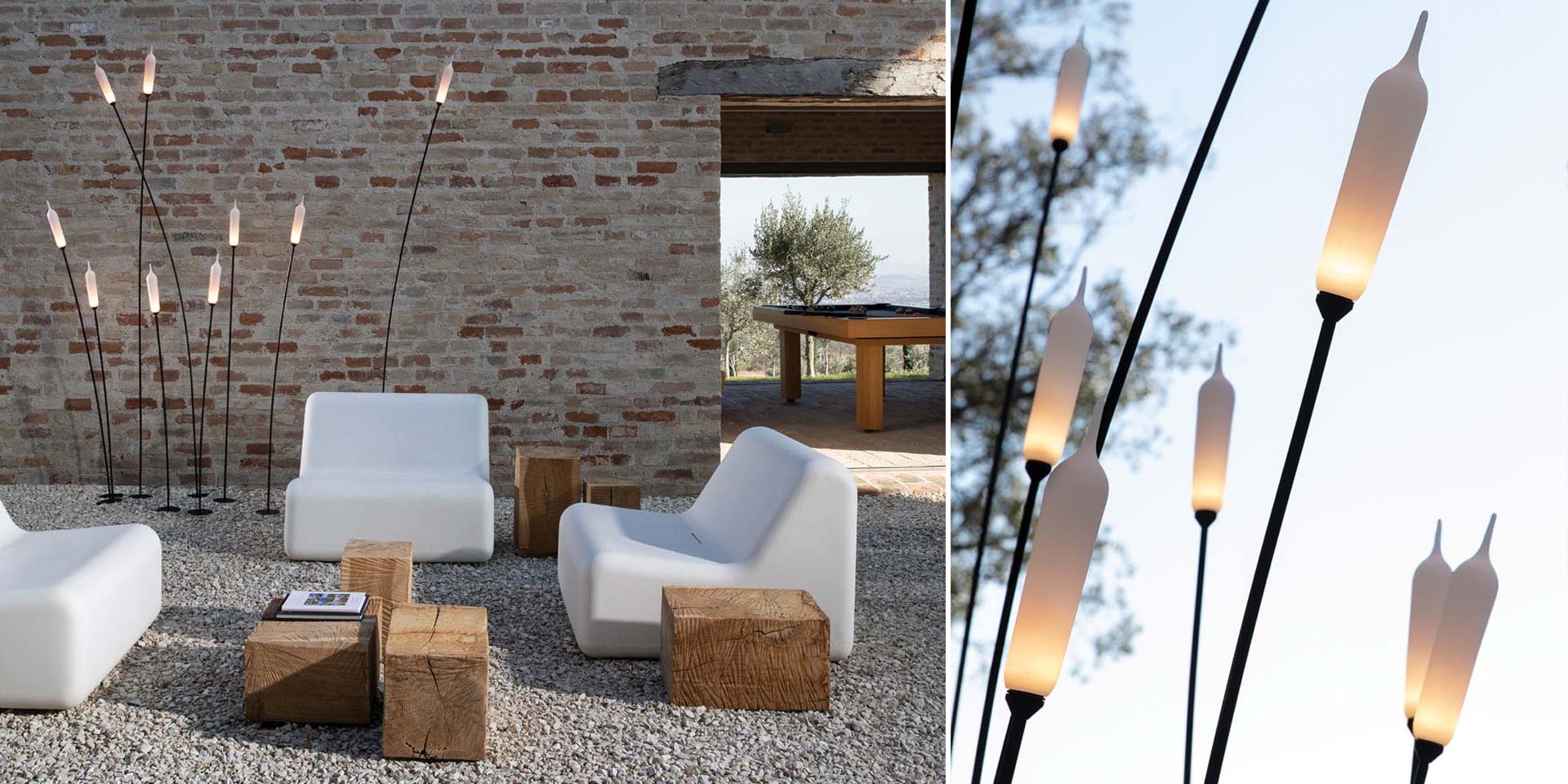 Modern outdoor lighting that looks like bulrush or cattail plants.