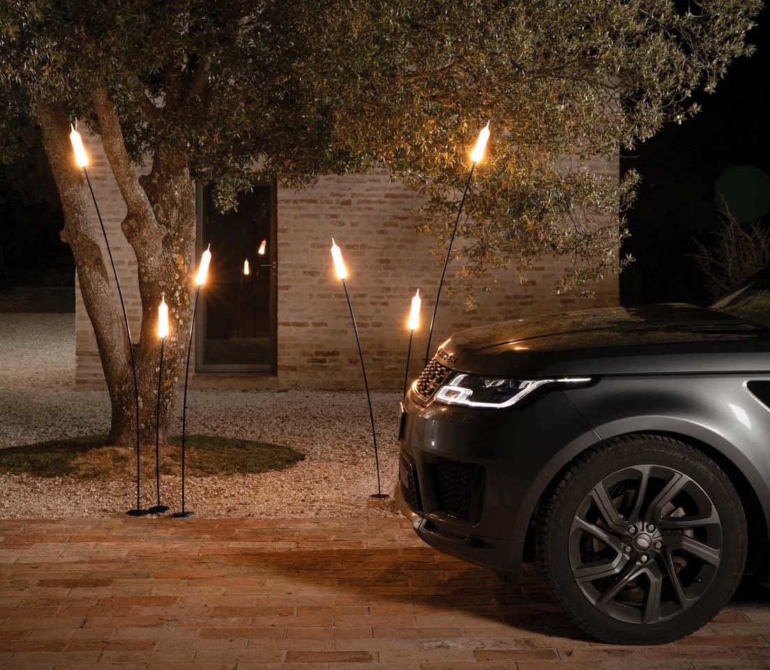 Modern outdoor lighting that looks like plants.