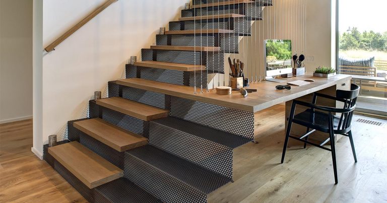 A Desk Was Combined With These Stairs To Create A Small Home Office