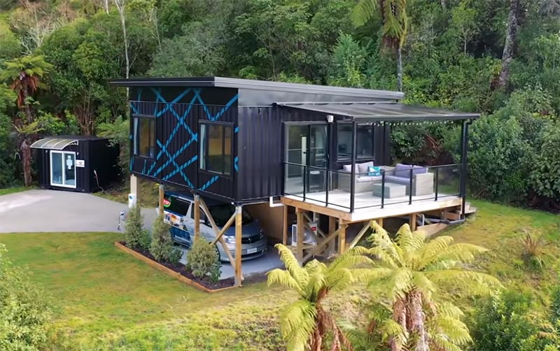 A small house in New Zealand made from three shipping containers.