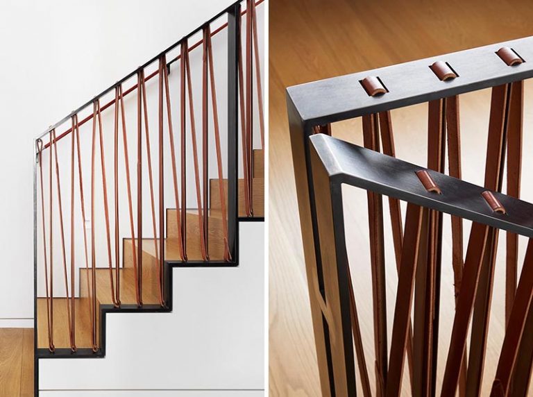 A Stair Railing Made From Steel And Leather Gives A Modern Industrial Look To This Home